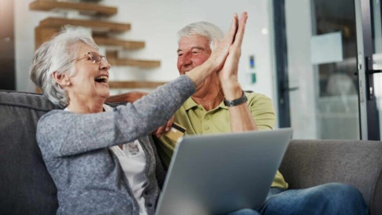 Older-people-high-five-happy-share-price-news-16_9-1200x675