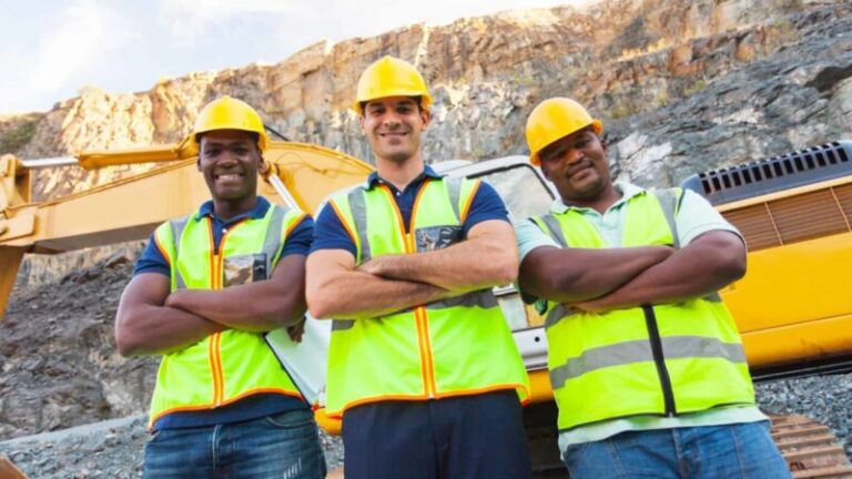 Three-happy-miners-at-quarry-1200x675