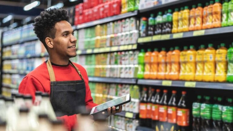 man-doing-stocktake-at-supermarket