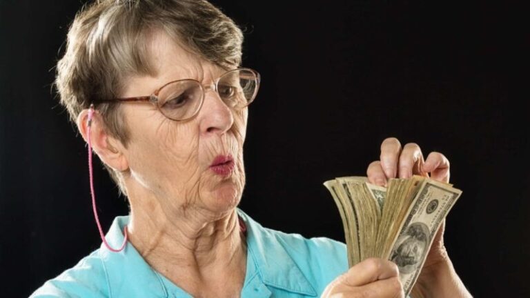 woman-counts-cash-16_9-1200x675